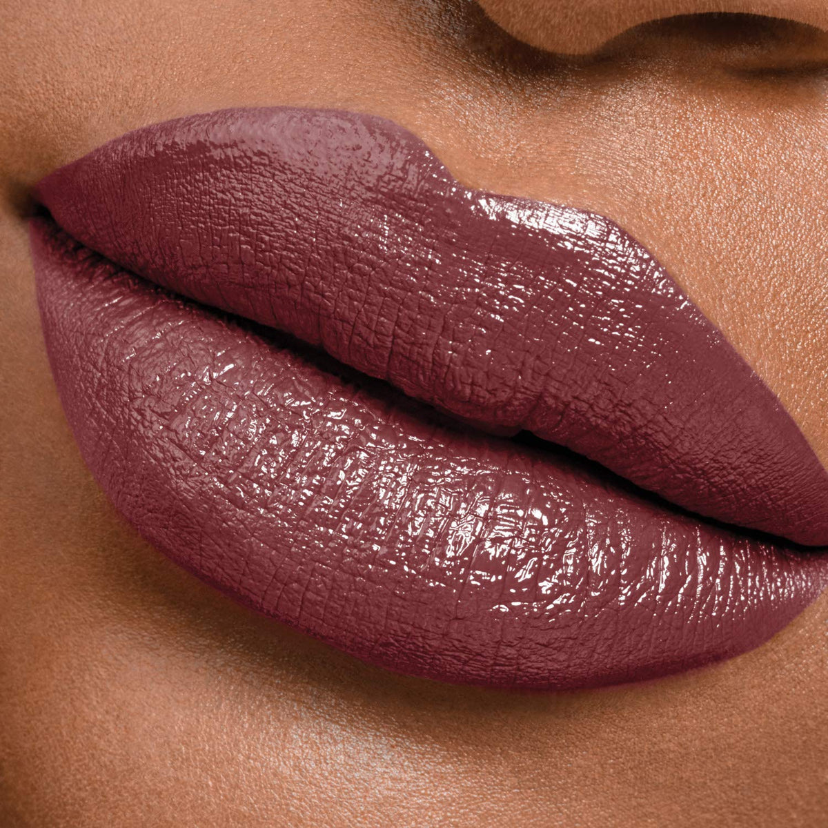 MAYBELLINE Super Stay 24 Liquid Lipstick Unlimited Raisin in makeup setup