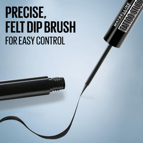 MAYBELLINE Tattoo Studio Dip-Ink Liquid Eyeliner Black Track application on model
