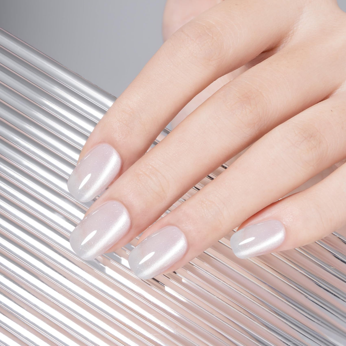 MAYCHAO Cat Eye Gel Nail Polish application on nails