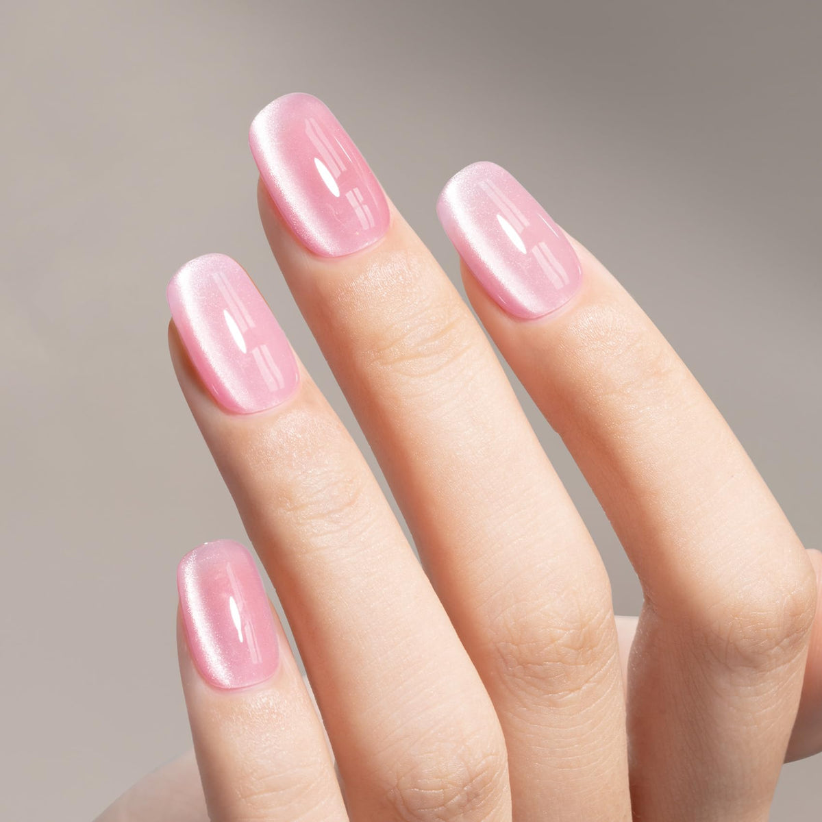 MAYCHAO Jelly Pink Cat Eye Gel Nail Polish 15ML application on nails