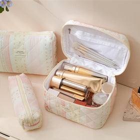 Medium HBselect Quilted Makeup Bag side view with zipper