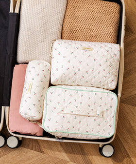 Medium size HBselect makeup bag opened with cosmetics inside