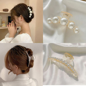 Mehayi pearl hair claw clips on a vanity table