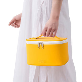 Meiyuuo Travel Makeup Bag held by a hand