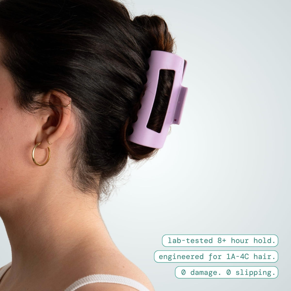 MELLO Medium Hair Clip on a woman's hair during workout