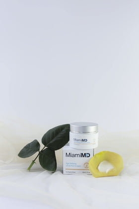 MiamiMD Age-Defying Lifting & Firming Face Cream on a bathroom counter