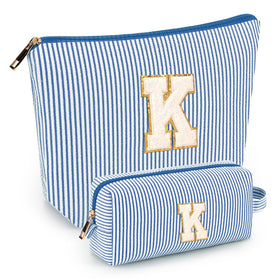 mibasies blue cosmetic bag front view with alphabet letters