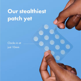Mighty Patch Mini Invisible+ Acne Pimple Patch in hand
