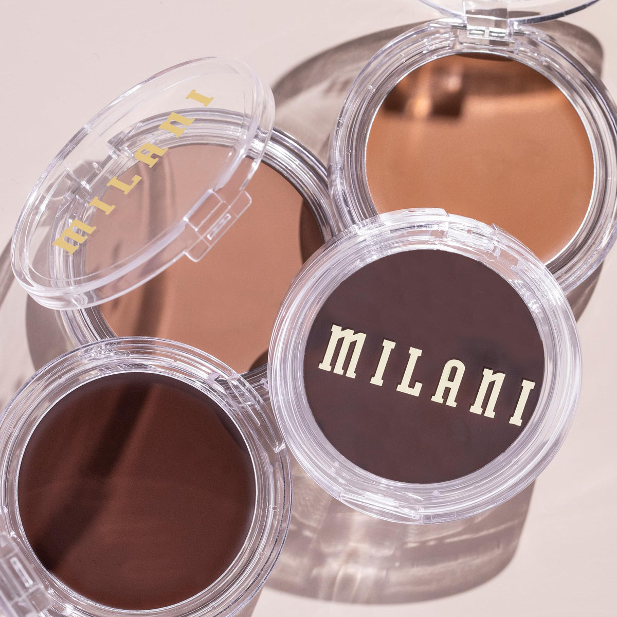 Milani Cheek Kiss Cream Bronzer with brush application