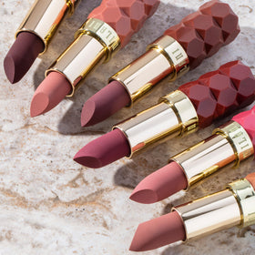 Milani Color Fetish Matte Lipstick in Passion applied on lips