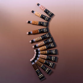 Milani Conceal + Perfect Liquid Undereye Brightener Nectar with other makeup products