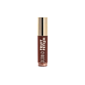 Milani Fruit Fetish Lip Oil Coco Cacao on a vanity