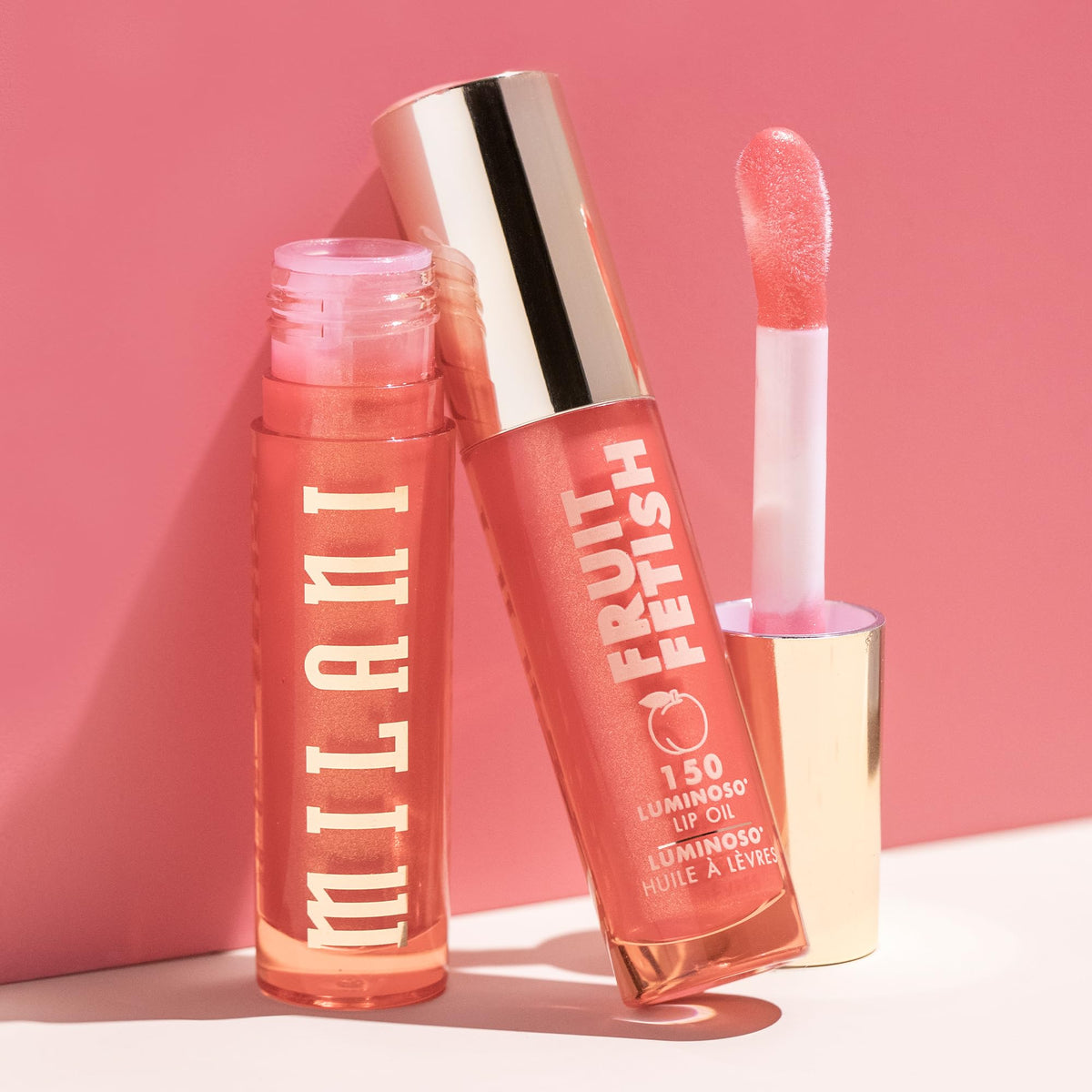 Milani Fruit Fetish Lip Oil Luminoso swatch on skin