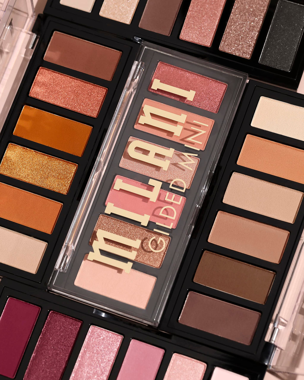 Milani Gilded Mini Eyeshadow Palette Champagne Problems in a makeup bag