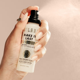Milani Sunscreen Setting Spray SPF 30 on vanity