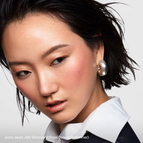 Milk Makeup Cooling Water Jelly Shimmer Stick Frosé on lips