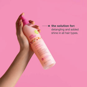 milk_shake Leave-In Conditioner Detangling Spray in a bathroom setting