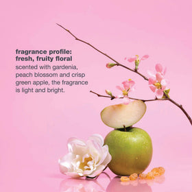 milk_shake Leave-In Conditioner Detangling Spray on a vanity with hairbrush