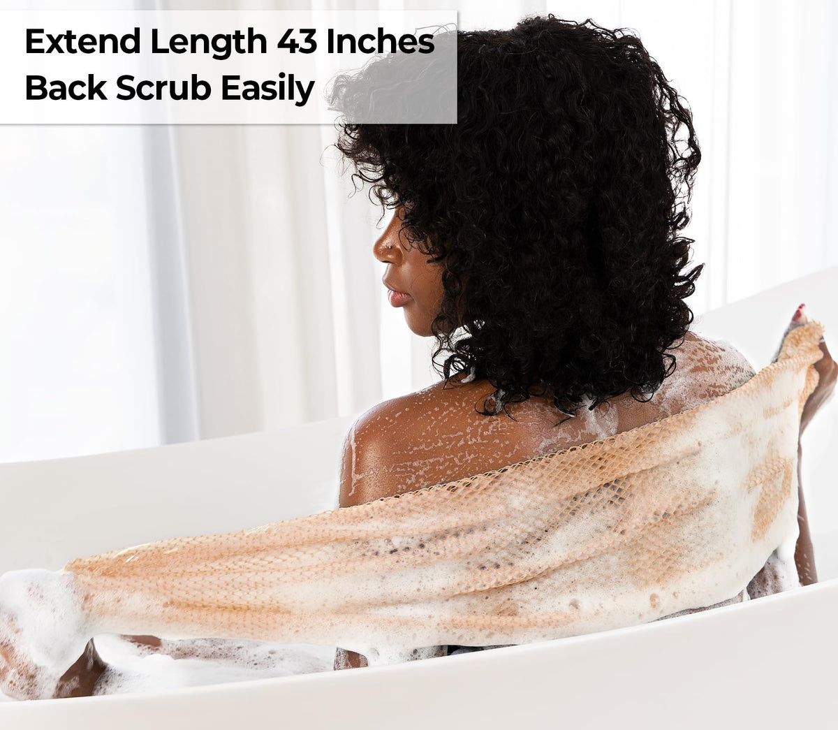 MINISENTIALS African Net Sponge showing elasticity and lather