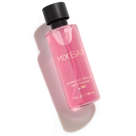 MIX:BAR Sparkling Hibiscus Hair + Body Mist 5oz bottle with floral background