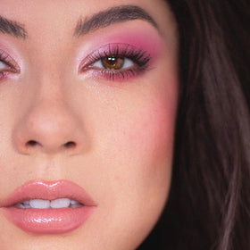 Model applying ColourPop Eyeshadow Palette Cloud Spun for a makeup look