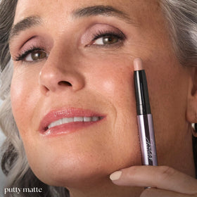 Model applying Julep Eyeshadow 101 Crème-to-Powder Stick