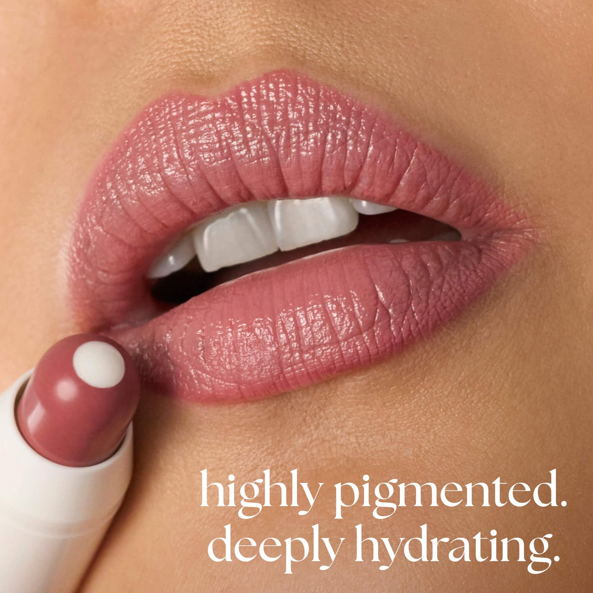 Model applying Julep It’s Balm Moisturizing Lip Color