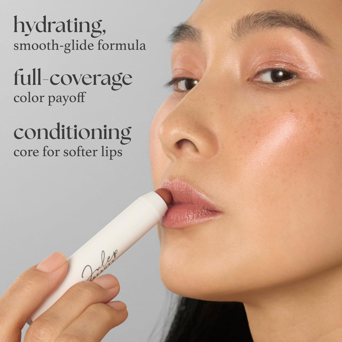 Model applying Julep Tinted Lip Balm