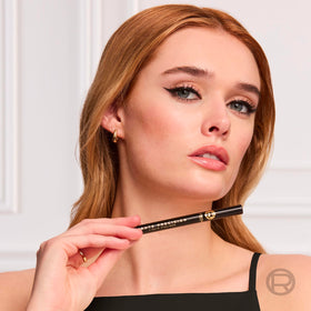 Model applying L'Oreal Paris Liquid Eyeliner