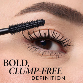 Model applying LAURA GELLER Kajal Longwear Mascara