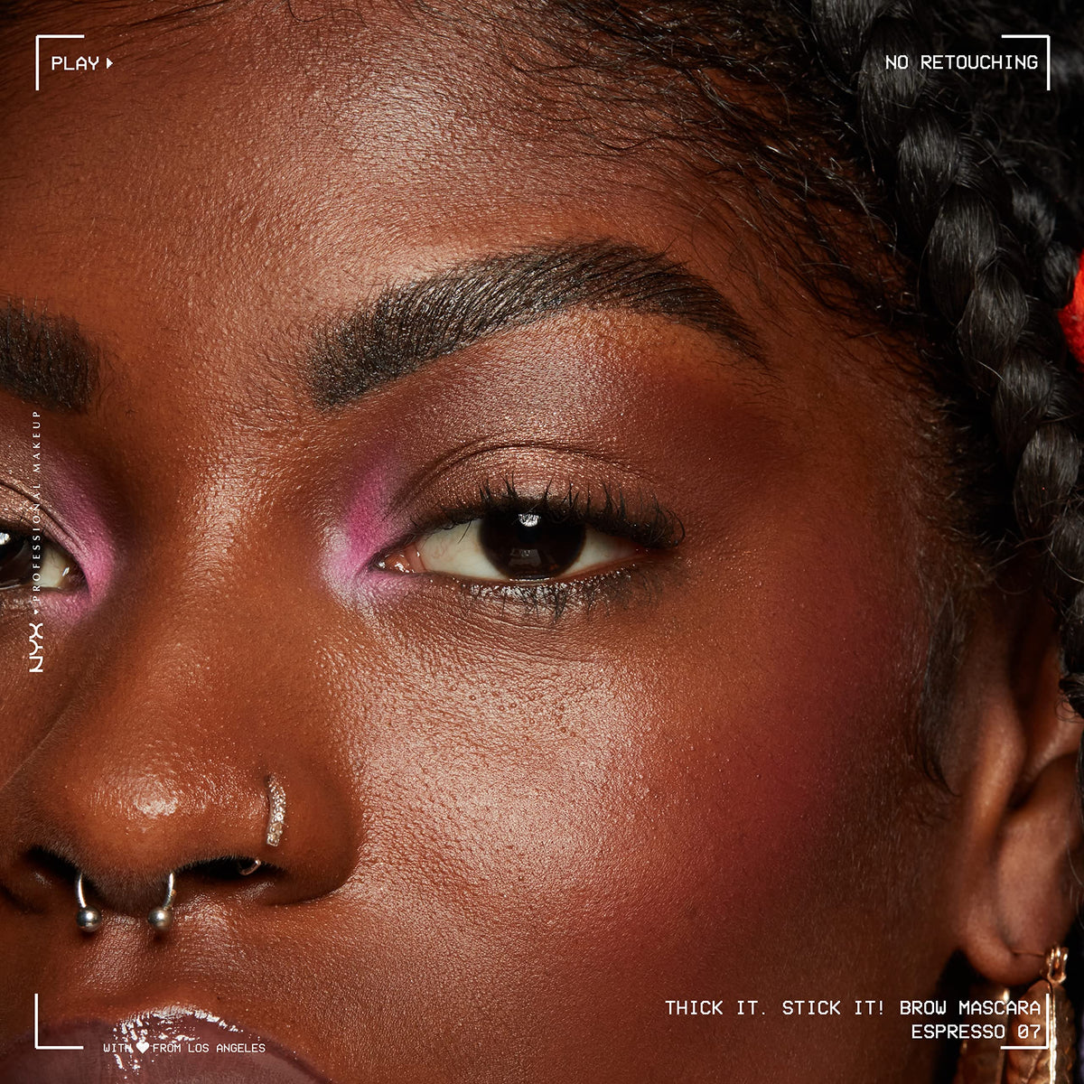 Model applying NYX Thick It Stick It Brow Mascara