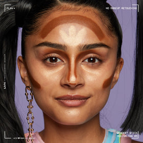 Model applying NYX Wonder Stick on cheekbones for highlighting