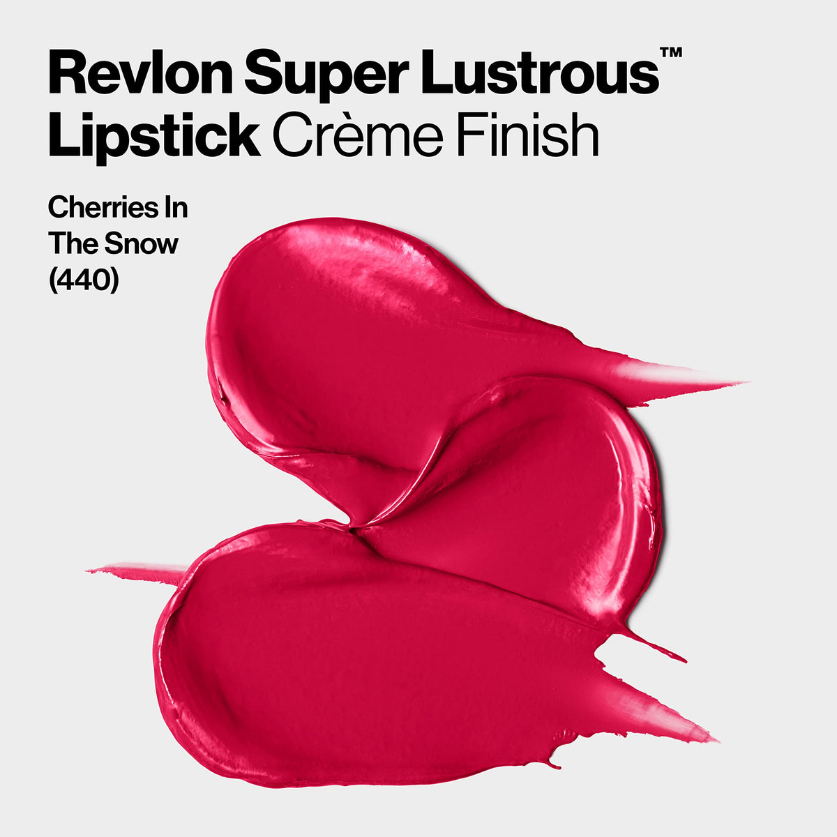 Model applying REVLON lipstick in Cherries in the Snow