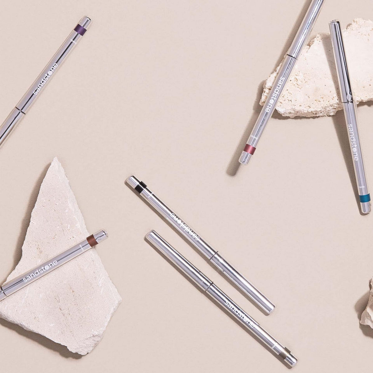 Model applying Sandstone Scandinavia Waterproof Eyeliner Pencil