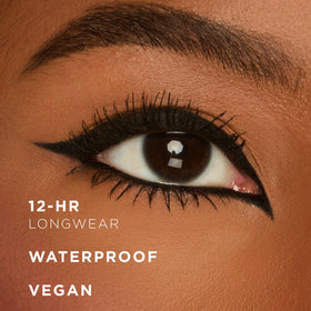 Model applying tarte Double Take Eyeliner in a makeup setting