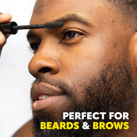 Model applying The Beard Club beard dye
