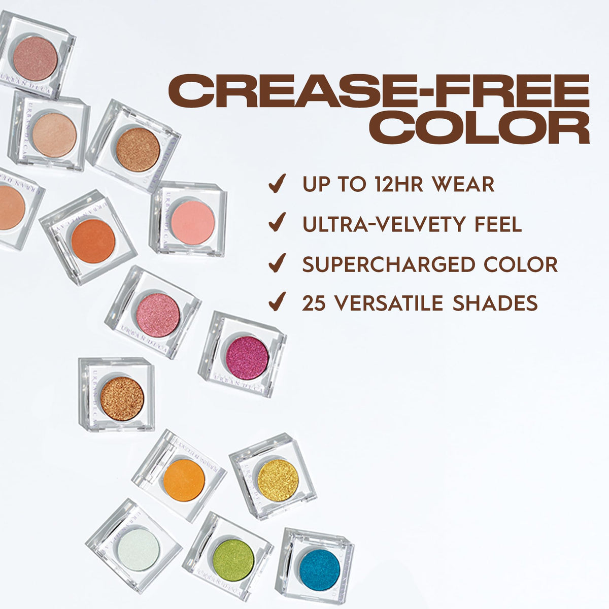 Model applying URBAN DECAY 24/7 Teal Shimmer Eyeshadow