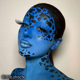 Model showcasing Mehron Makeup Paradise AQ Lagoon Blue body paint
