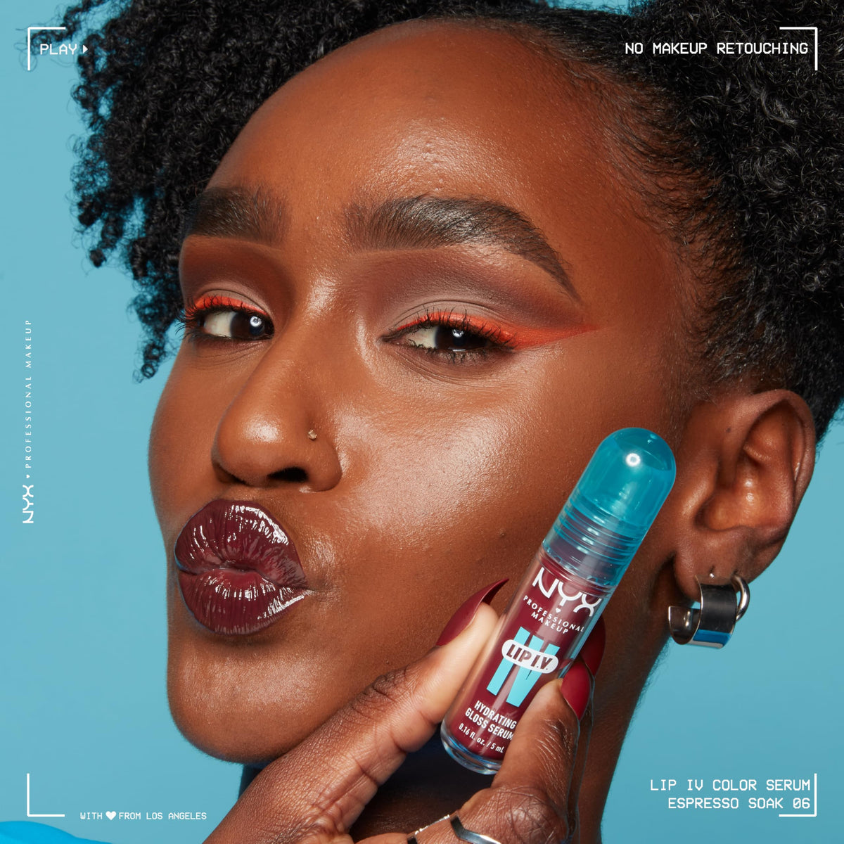 Model wearing NYX Lip IV Hydrating Glossy Lip Stain Red-y Set Wet