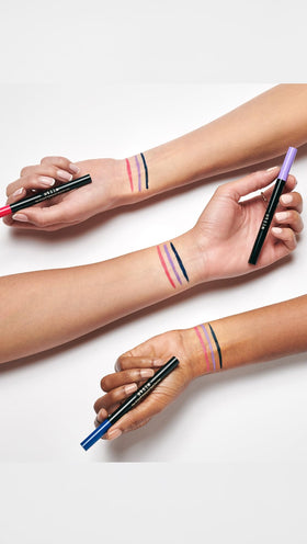model wearing stila Waterproof Liquid Eyeliner Cosmic Pink