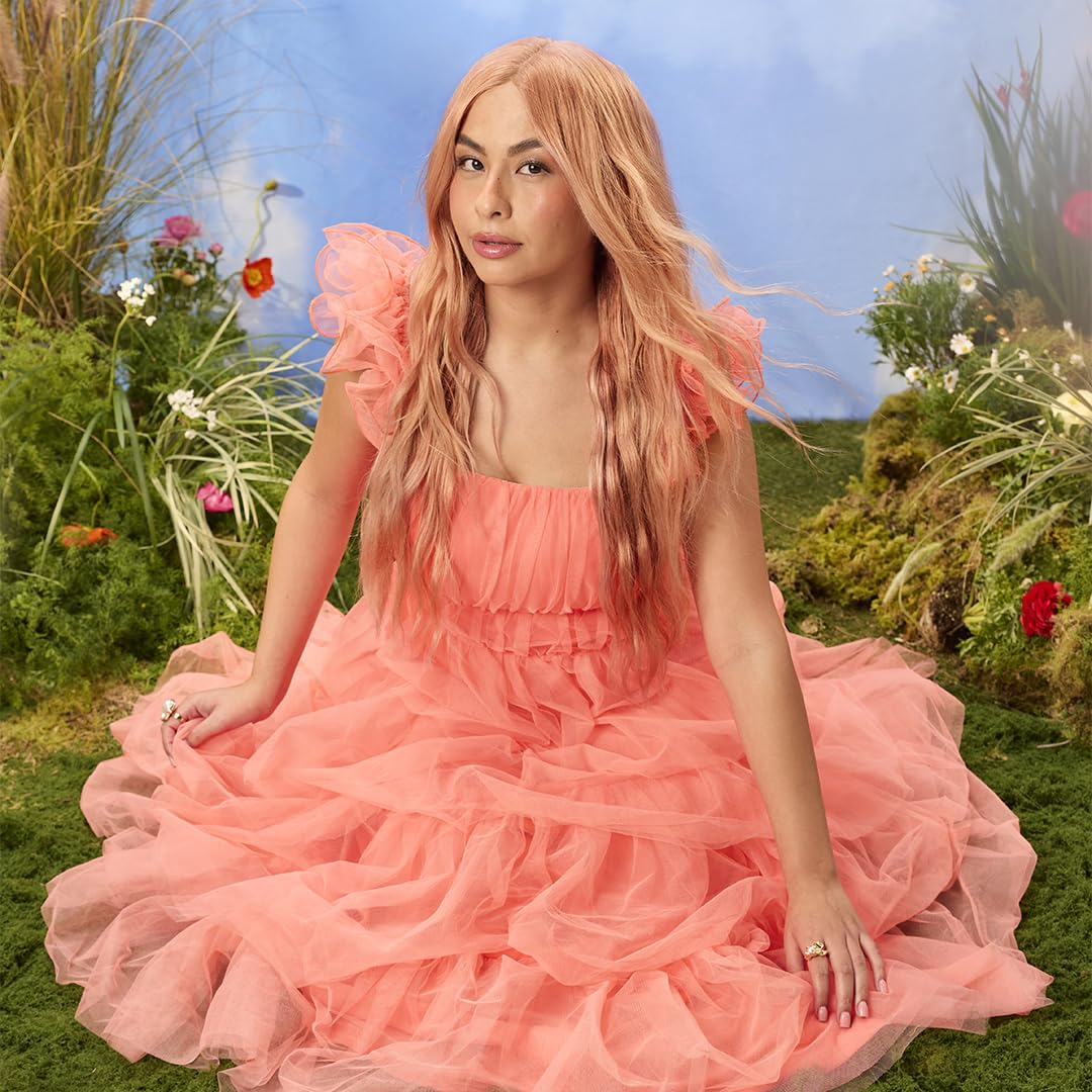 Model with vibrant apricot hair using ARCTIC FOX Apricot Anarchy