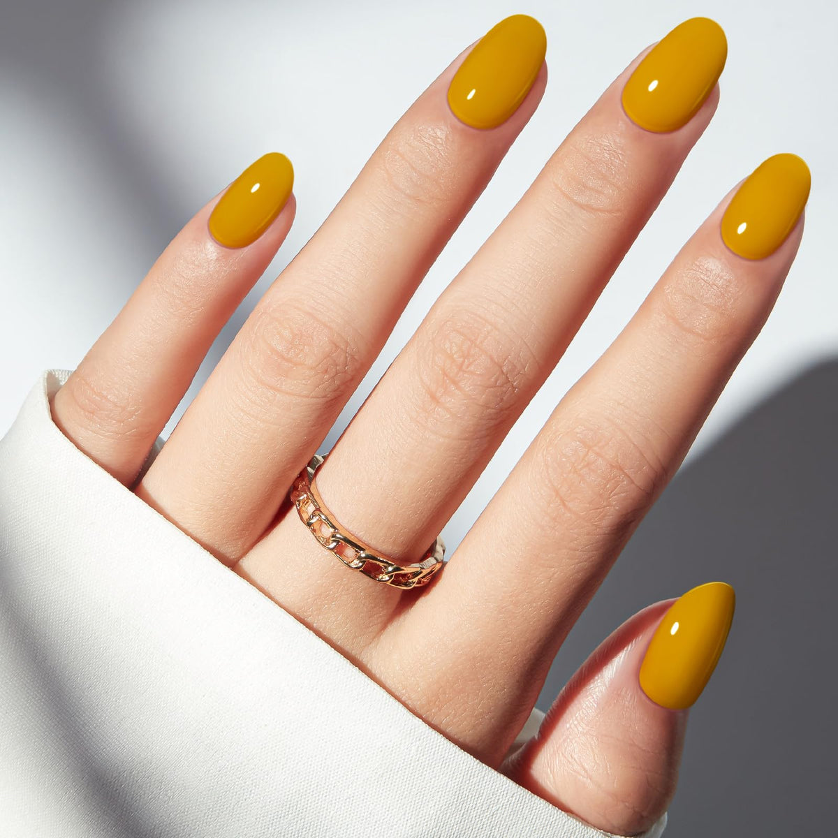 modelones Ginger Yellow nails showing different sizes and shapes