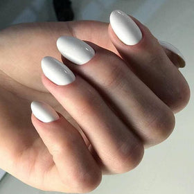 modelones Short Press on Nails in various styles laid out