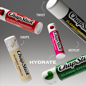 Moisture + SPF 15 ChapStick being applied to lips