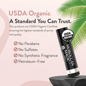Moroccan Magic Lavender Vanilla Lip Balm on a wooden surface
