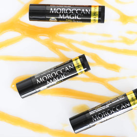 Moroccan Magic Organic Manuka Honey Lip Balm in a beauty setting