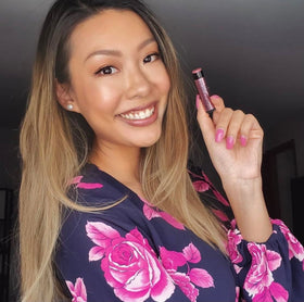 Moroccan Magic Perfect Pink Tinted Lip Balm on a wooden surface