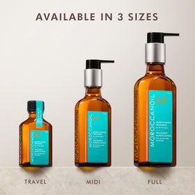 Moroccanoil 0.85 Fl. Oz. bottle with flowers