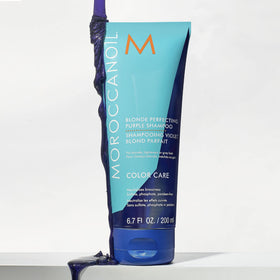 Moroccanoil Blonde Perfecting Purple Shampoo texture on hand