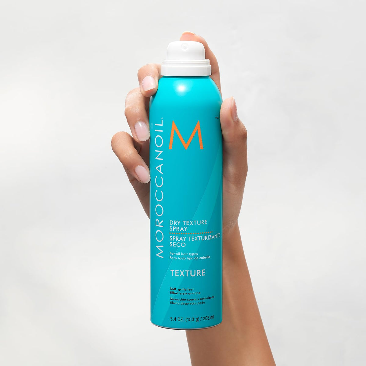 Moroccanoil Dry Texture Spray 5.4 Fl. Oz. in lifestyle setting